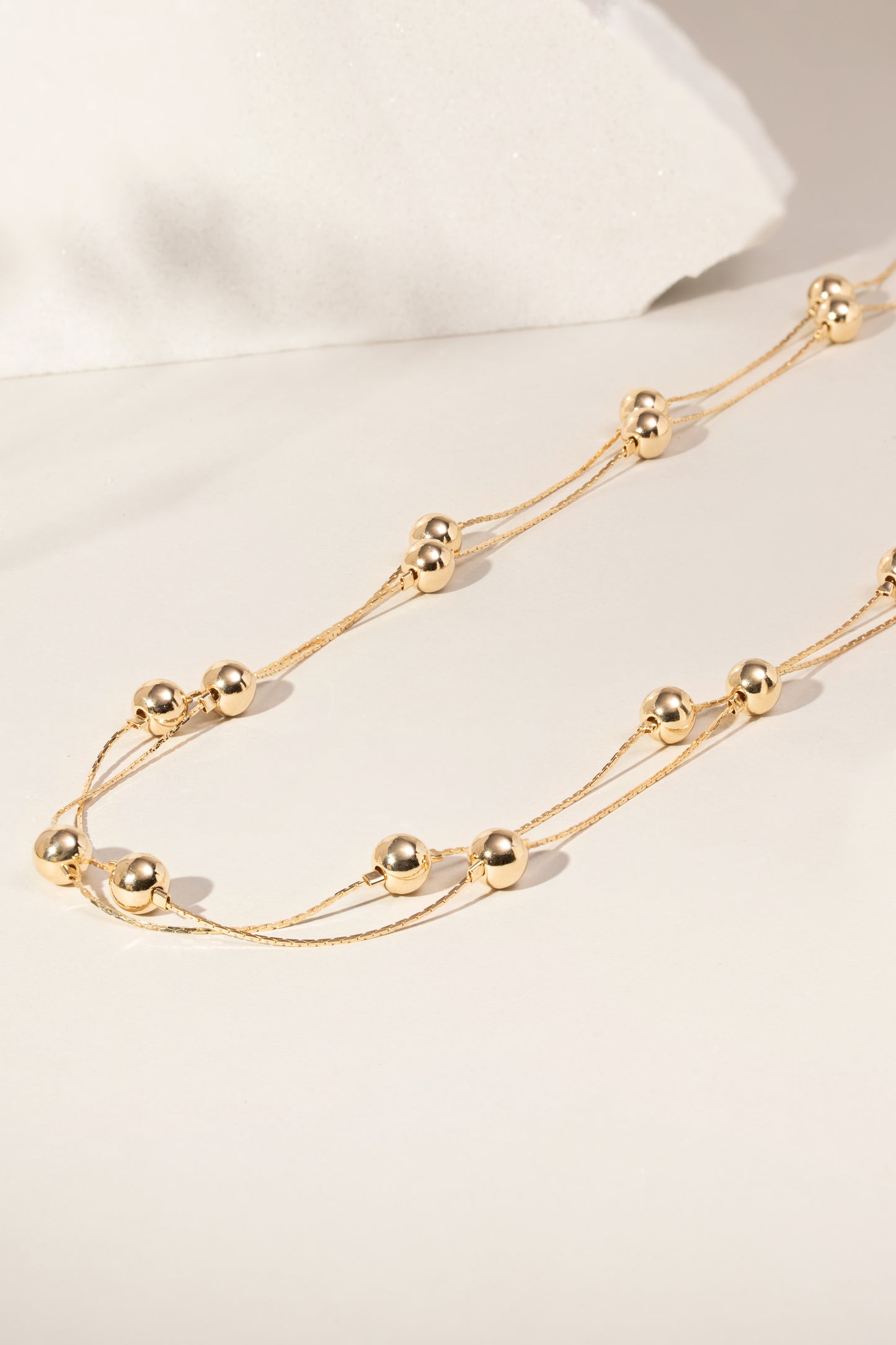 Colar Liso Esferas 124cm Banho de Ouro 18K